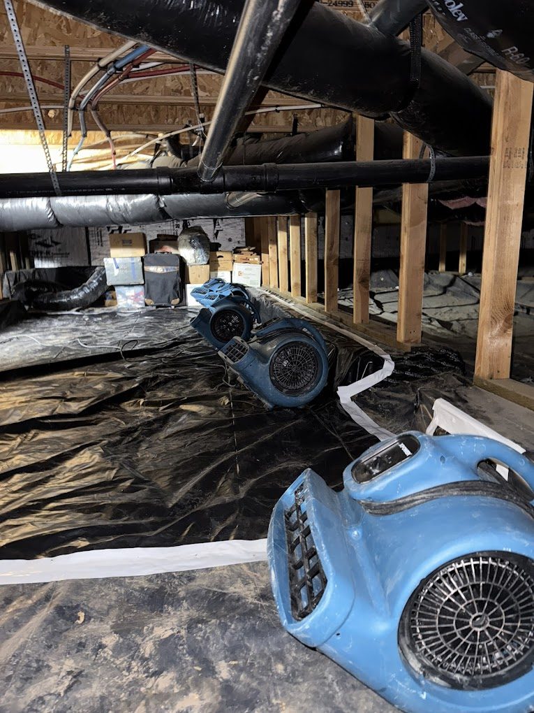 Drying equipment running in a crawlspace on a Peak remediation job